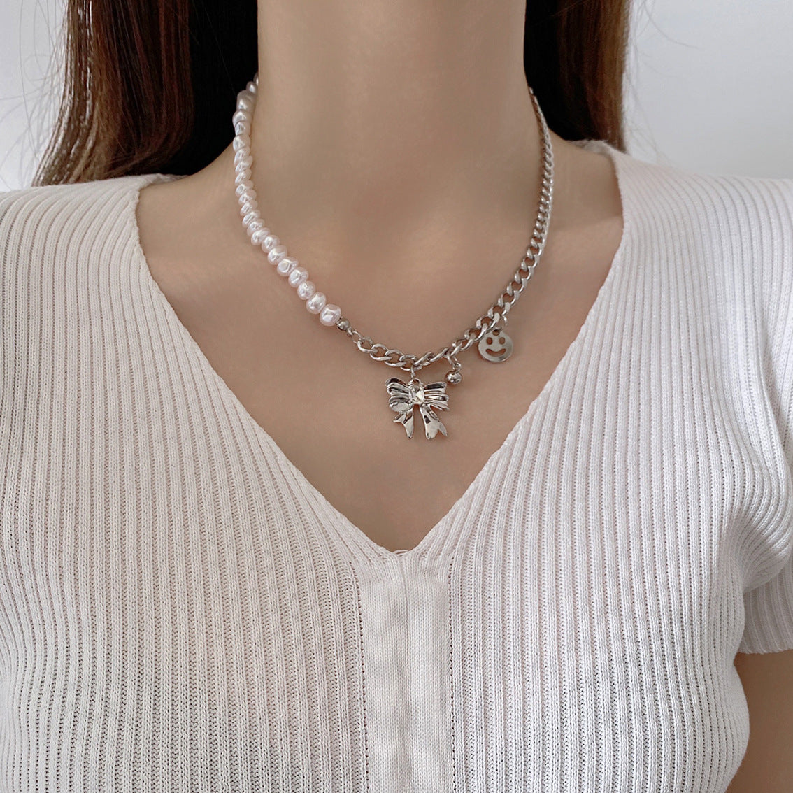 Wholesale Stitching Pearl Bow Smiley Necklaces